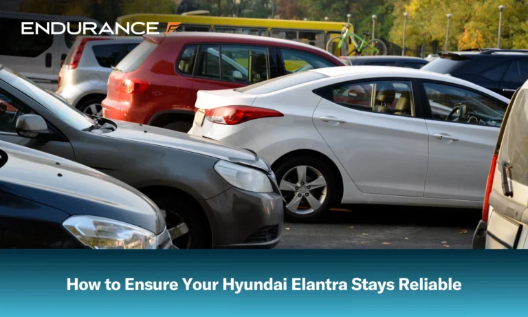 A Hyundai Elantra parked in a lot with other cars