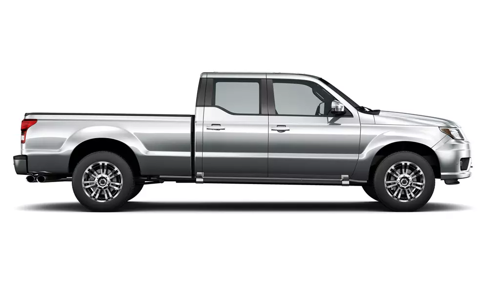 Side view of silver GMC truck