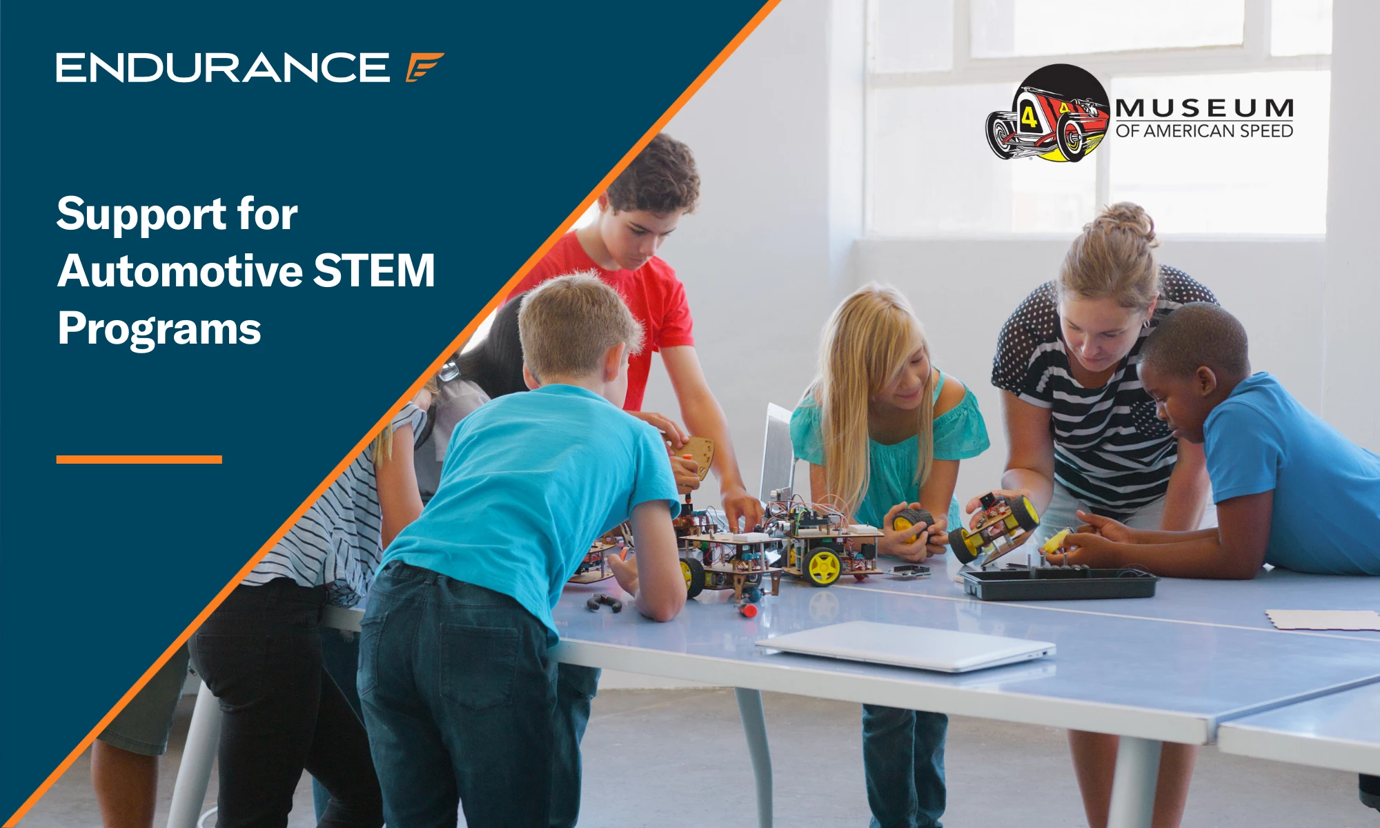 Students with a teacher working on automotive robots and STEM programming