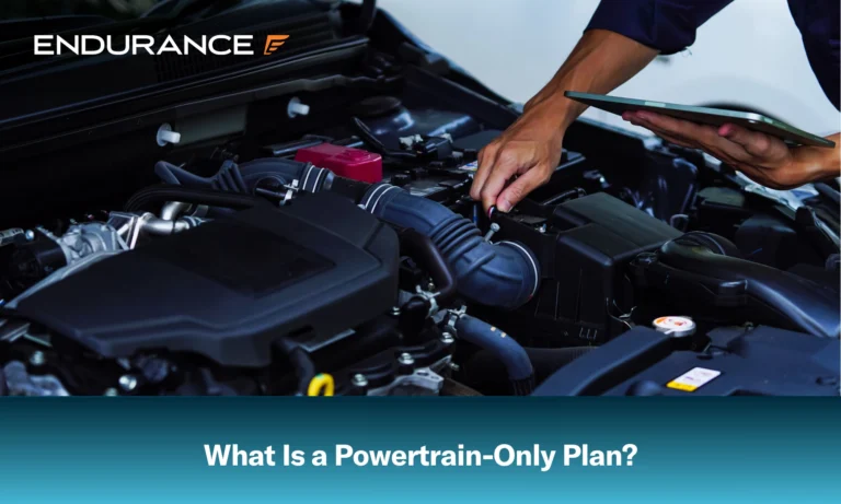 Auto mechanic hands using wrench to repair engine, what is a powertrain only warrany