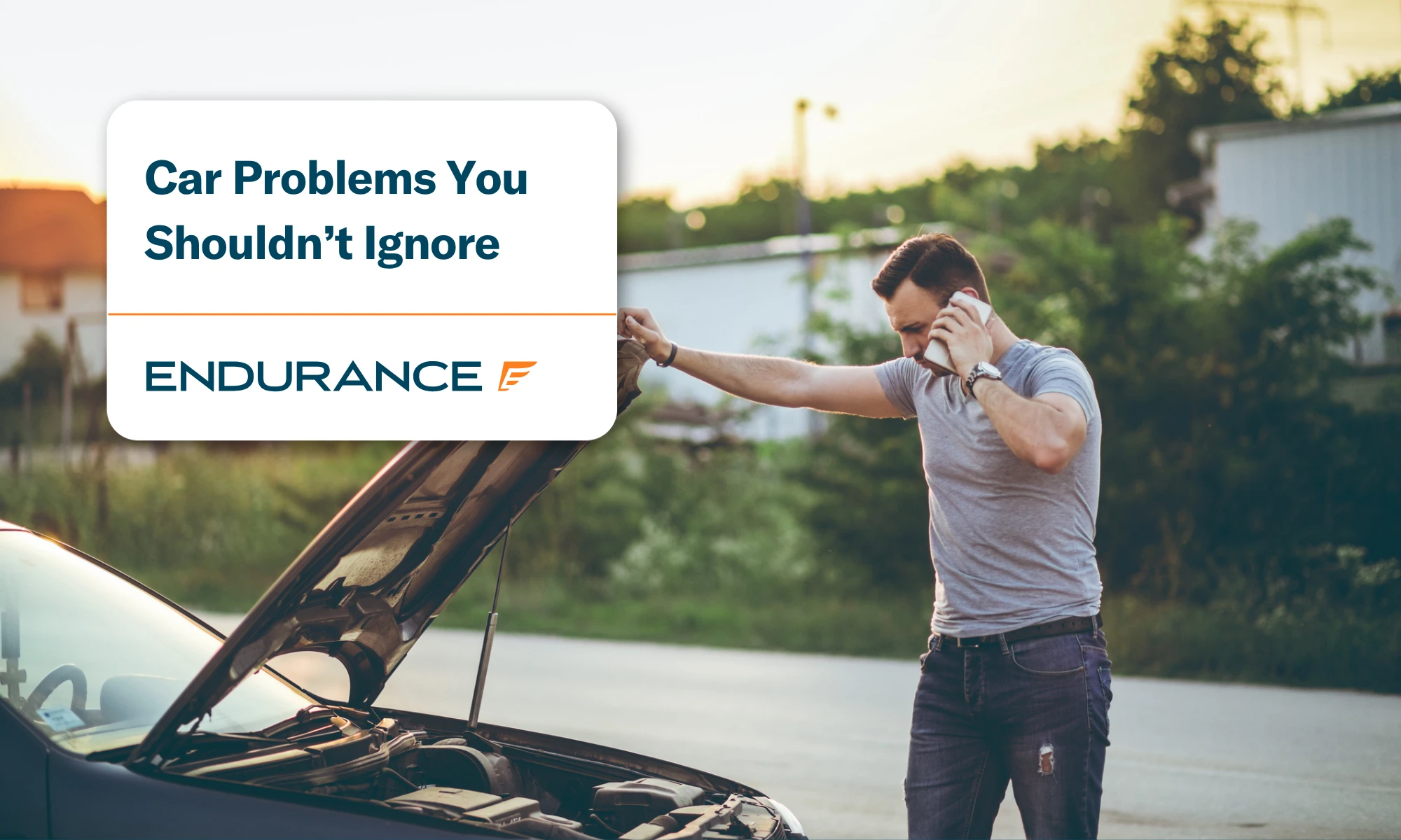 A man calling roadside assistance with his car hood up, learn car problems you shouldn't ignore